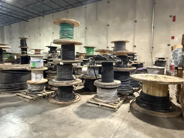 Wire reels and packaged cable in warehouse storage